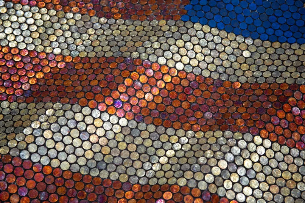 A recreation of the United States of America's flag with pennies.