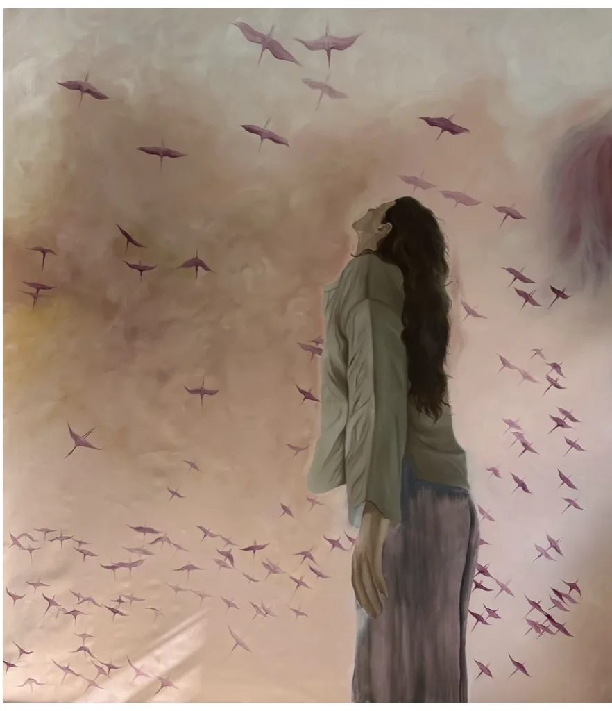 A woman with long hair looks upward surrounded by pink birds against a soft, pastel background. The scene conveys a sense of freedom and tranquility.